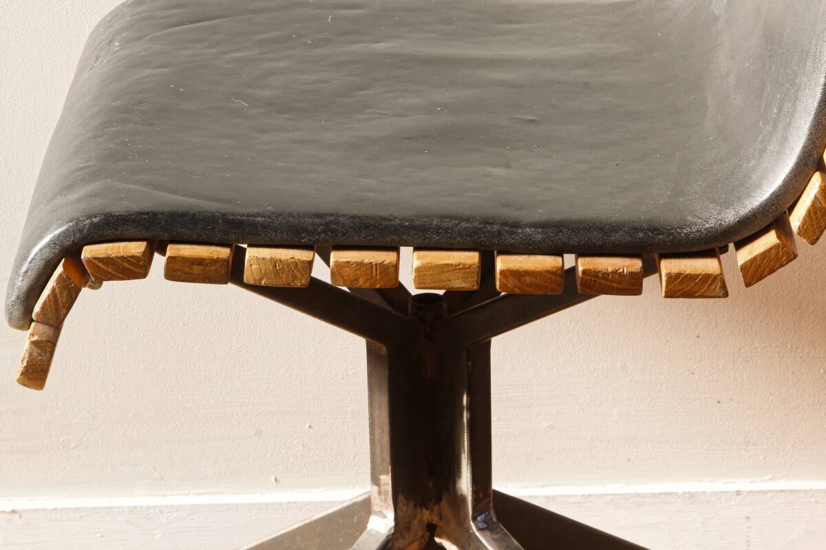 Handcrafted chair, laminated wood and leather