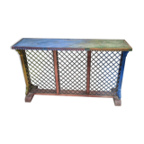 Colorful old standing eat with cast iron grill