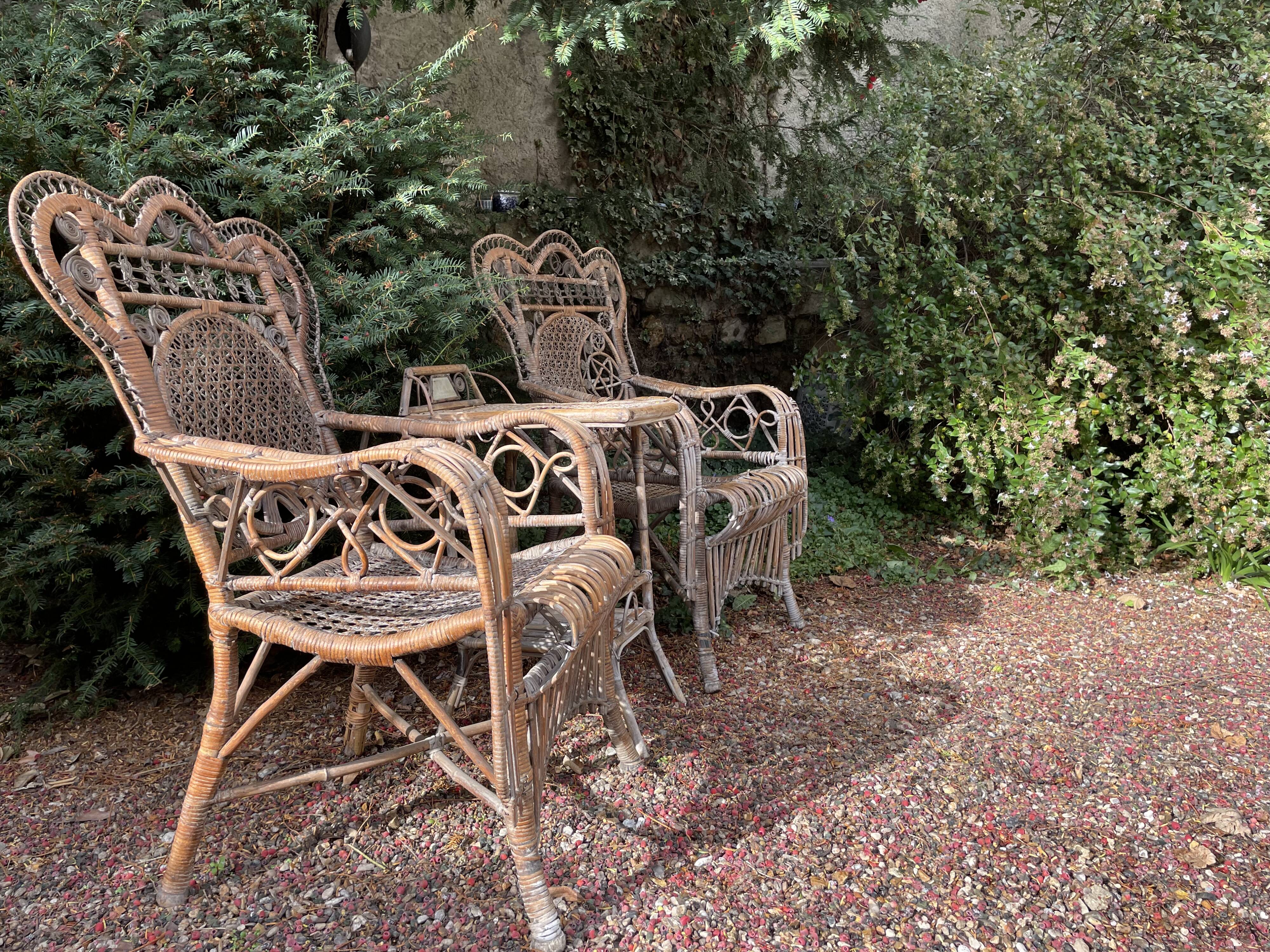 Paire de fauteuils anciens en rotin