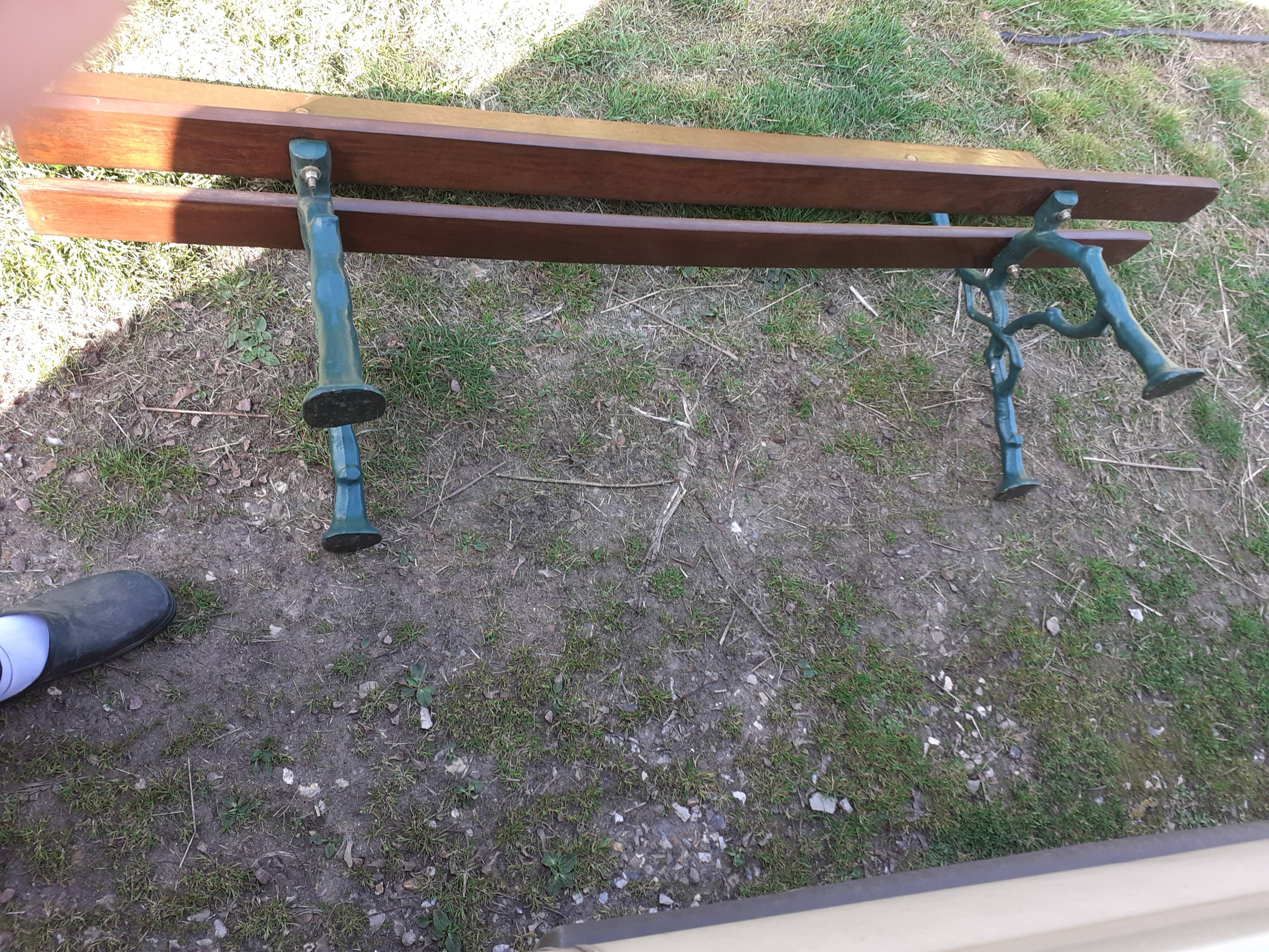 Old garden bench with cast iron feet