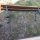 Old garden bench with cast iron feet