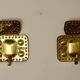A pair of mid-century Swedish brass wall lights.