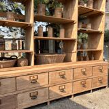 Large antique workshop furniture with drawers and shelves.