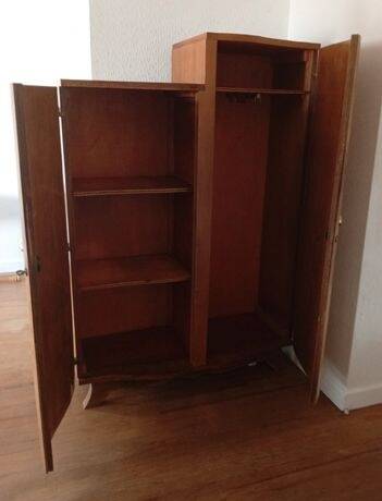 Asymmetrical wardrobe from the 1930s in Art Deco style.