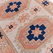 Tapis persan bleu marine et crème