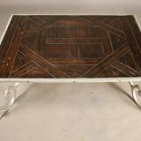 Coffee table on parquet wrought iron
