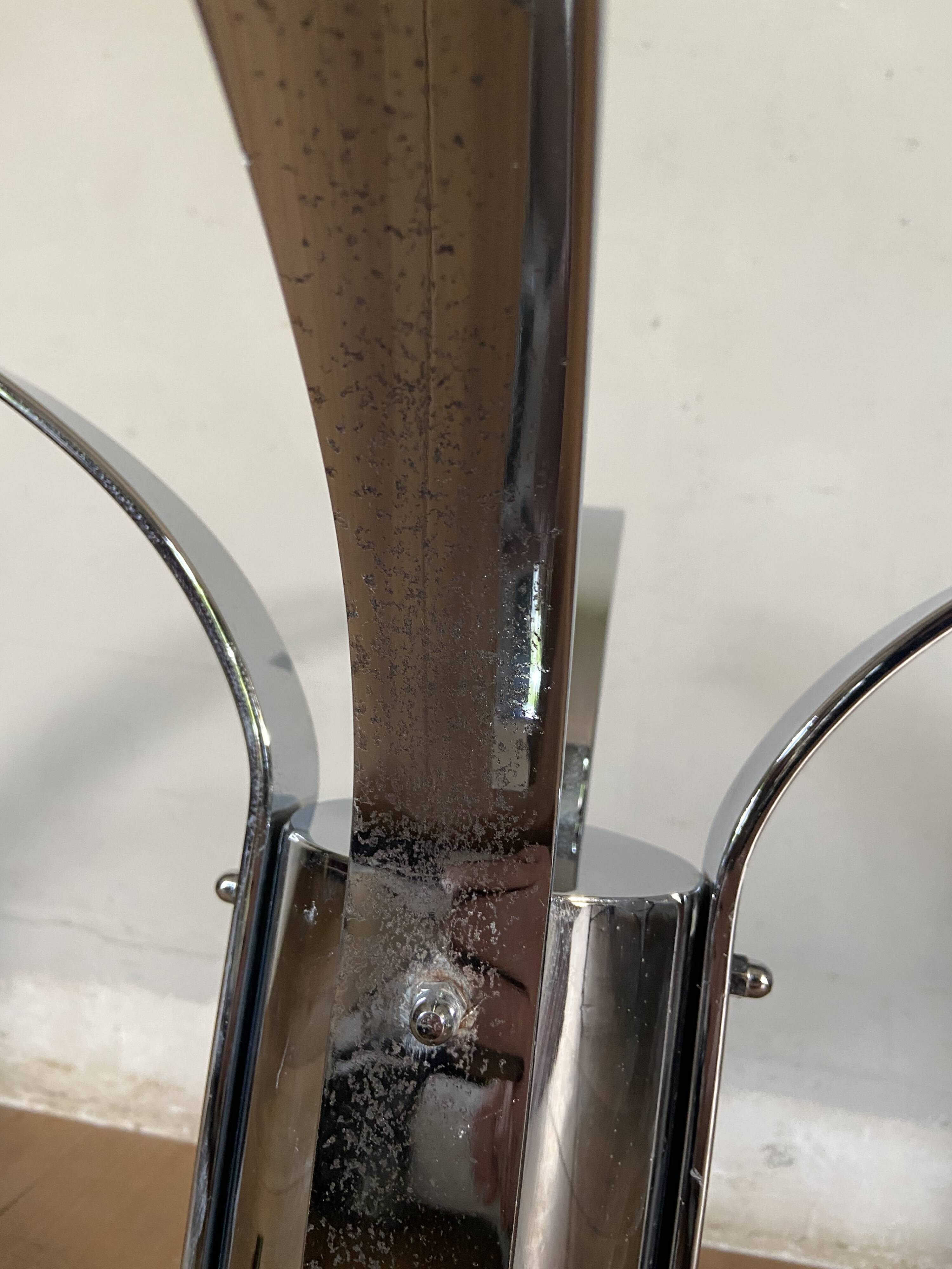 Modernist chrome and smoked glass table with tulip base from the 70s