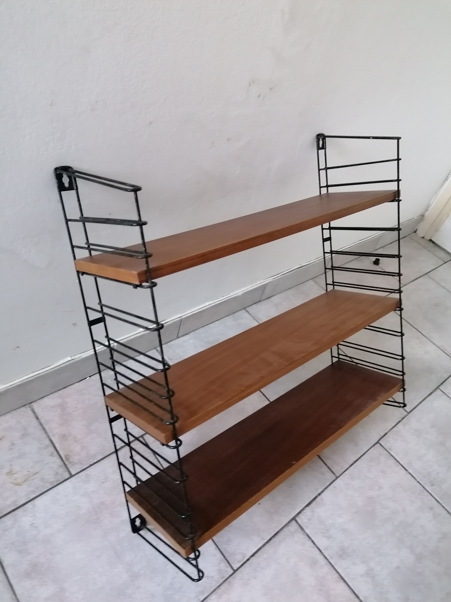 Wall shelf signed Tomado Holland