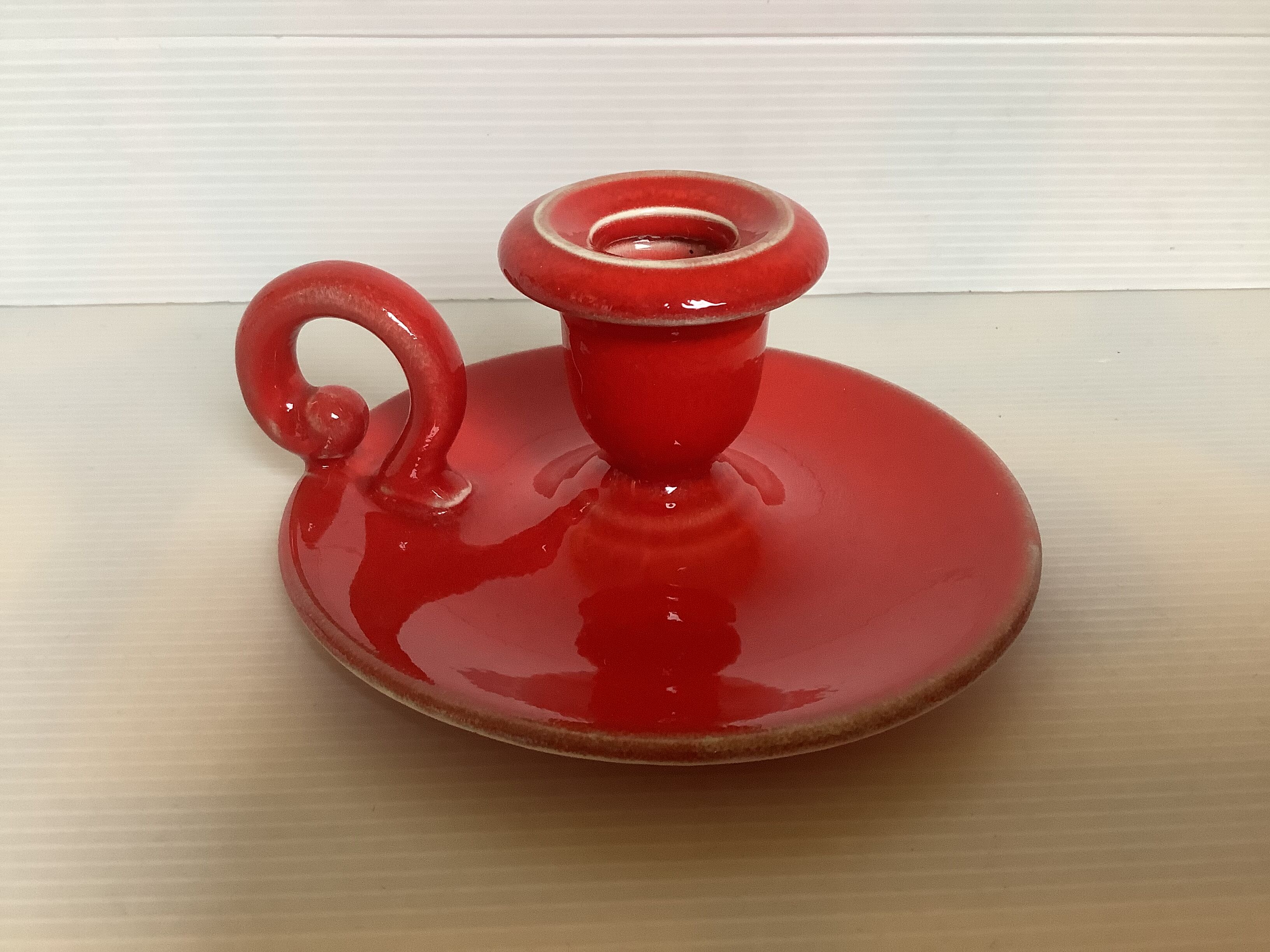 Red ceramic cellar rat candle holder
