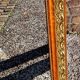 Authentic original Italian fireplace mirror, frame and pediment.