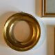 Trio of round golden wood frames and rectangles
