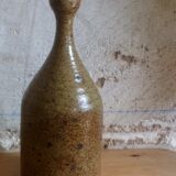 Bottled sandstone vase with a narrow neck