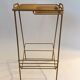 Magazine holder table in gold metal 1950 vintage