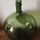Dame jeanne bonbonne green glass round bubbles