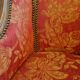 Pair of louis xv cabriolet armchairs with sculpted wood and pink & red floral fabric