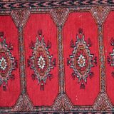 Tapis vintage ouzbek Bukhara fait main en laine – 62 x 106 cm – Années 1970