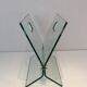 Designer magazine rack in glass and brushed steel