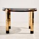 Restored dining table in mahogany and brass.