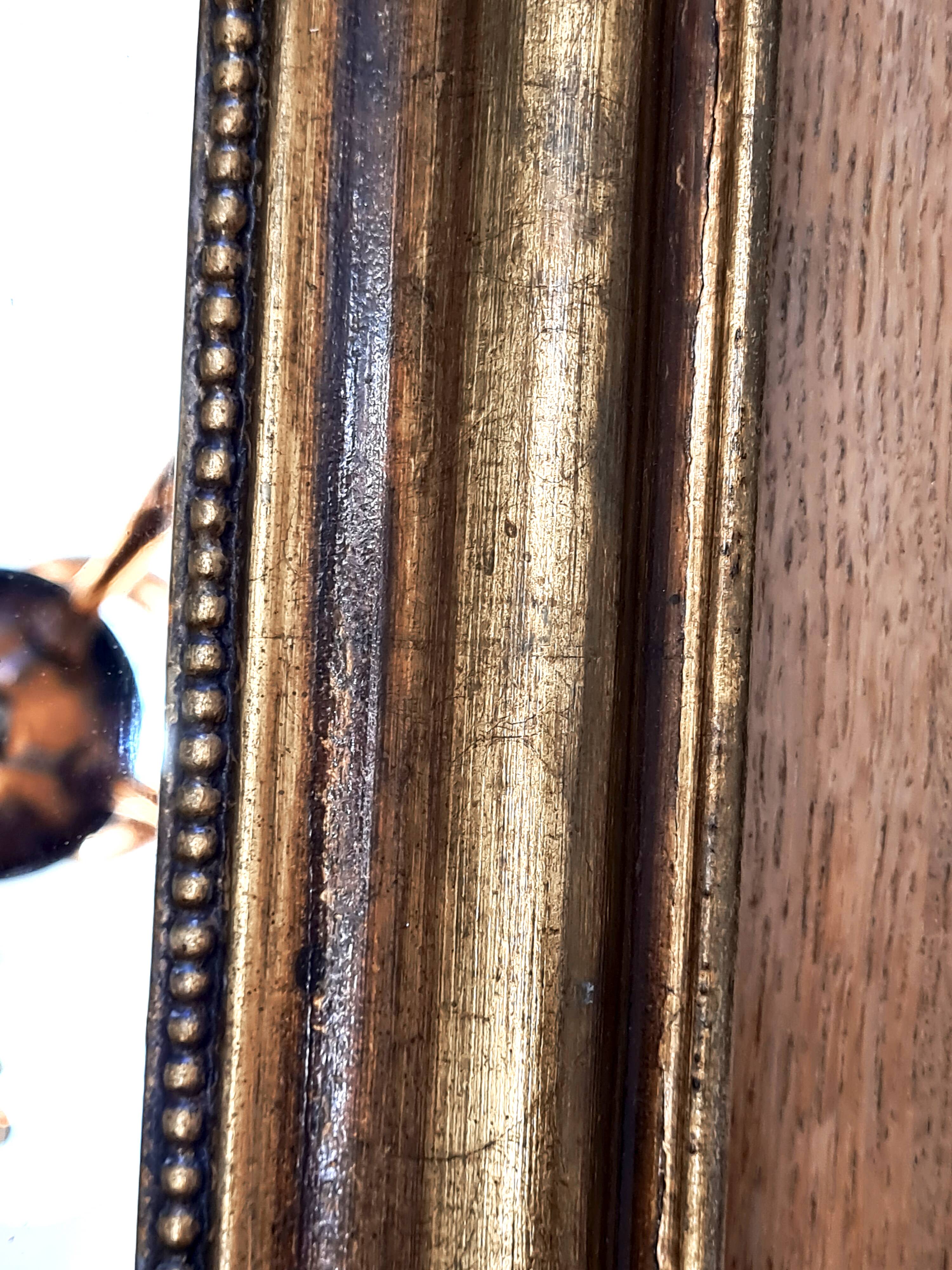 Antique Louis-Philippe gilded mirror “Apoline”