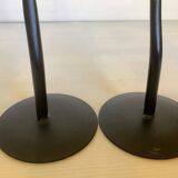Pair of black hysteria-style candlesticks