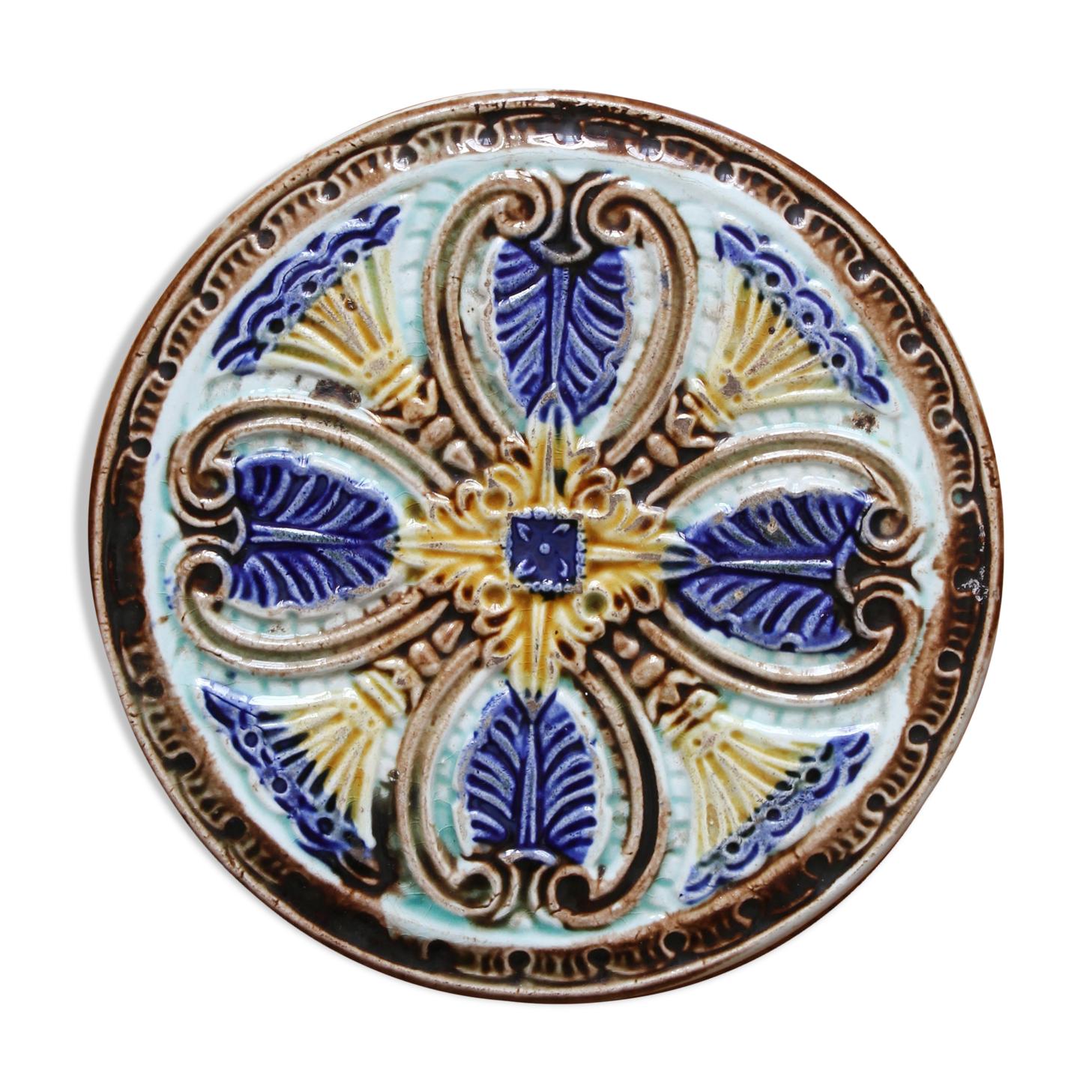 Art Nouveau earthenware bottle coaster/trivet, late 19th/early 20th century