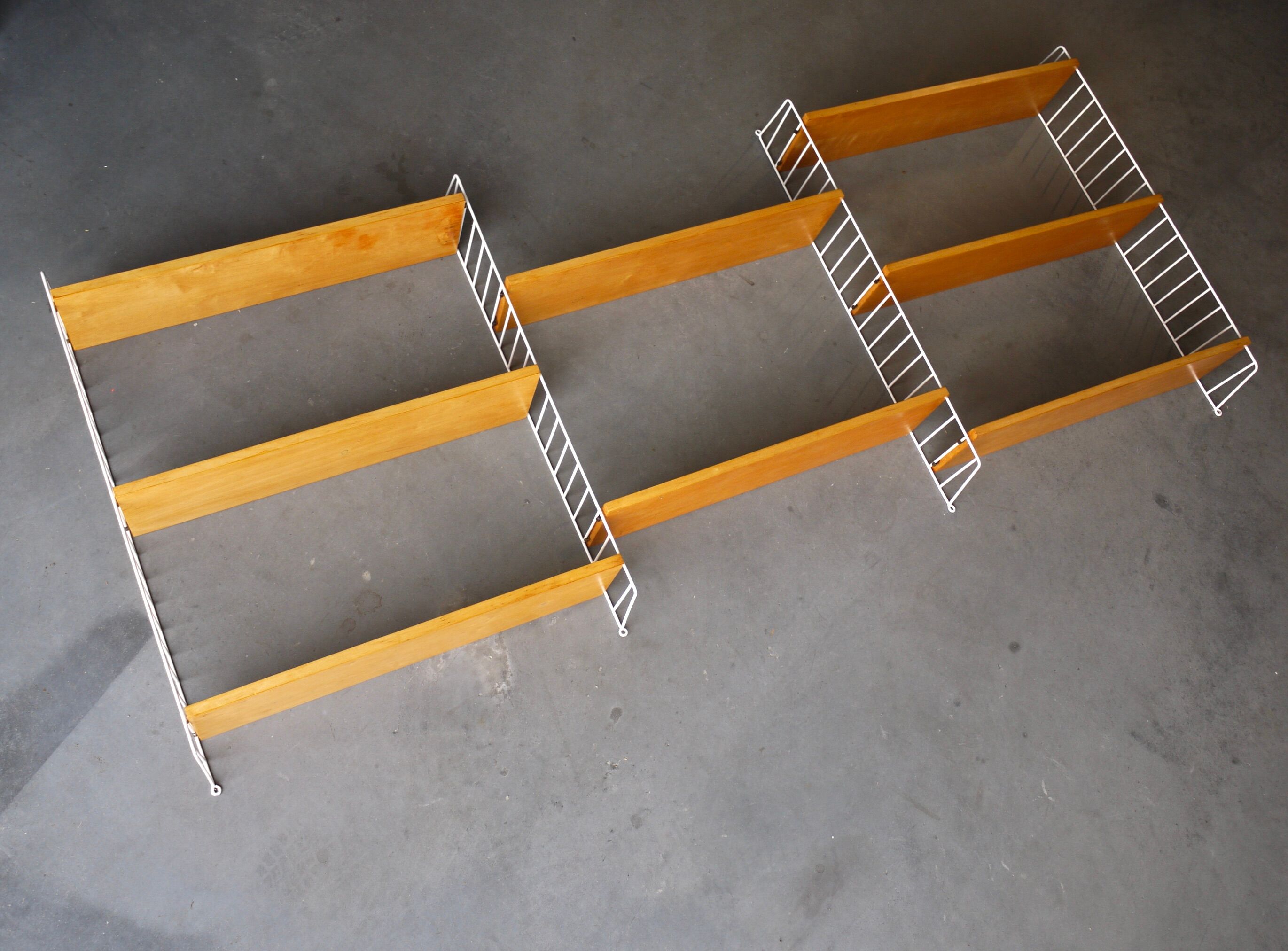 Vintage wall shelving unit by Nisse Strinning for String AB. 1950s