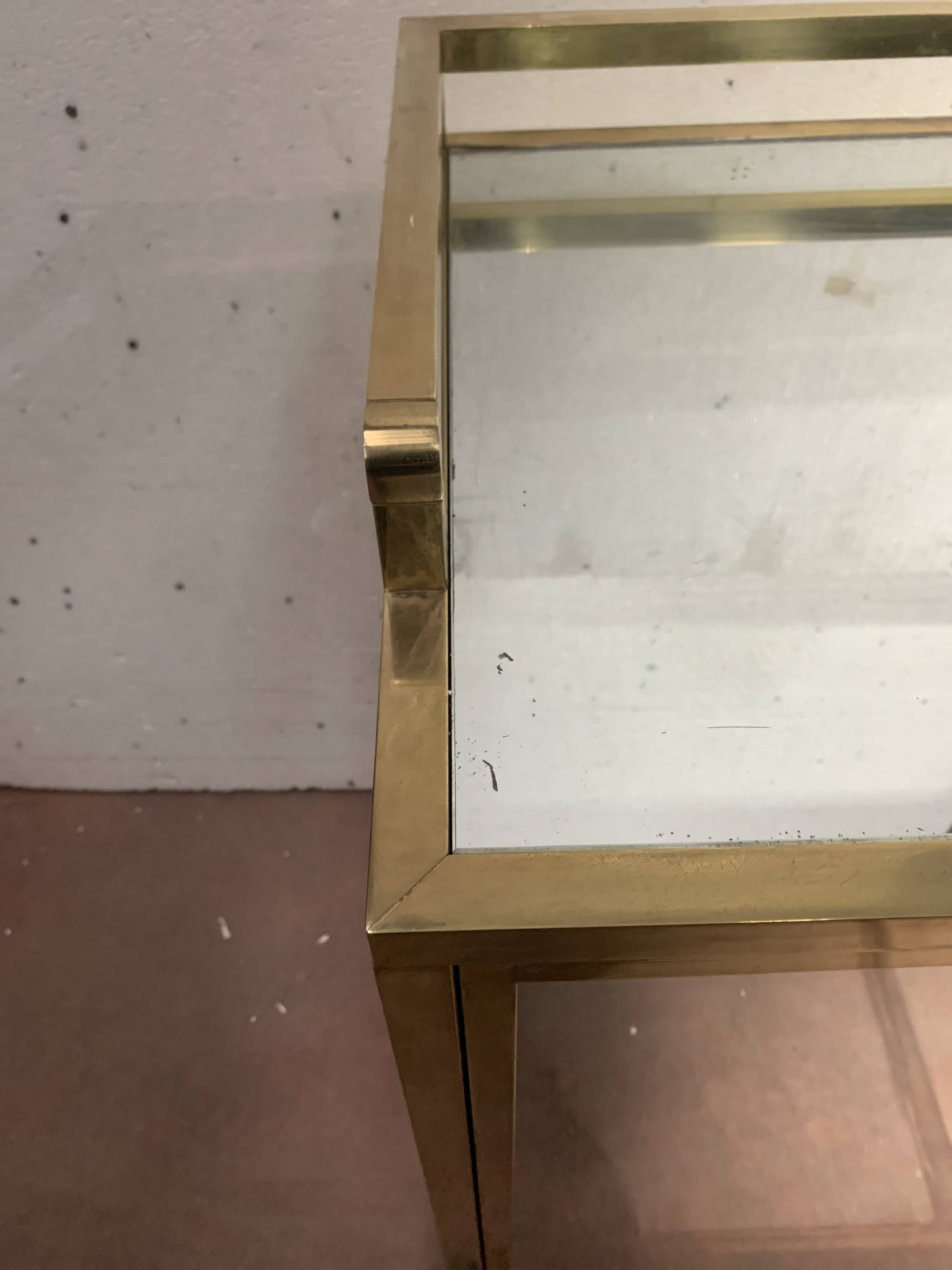 1970s brass bar with a mirrored front from the 20th century.