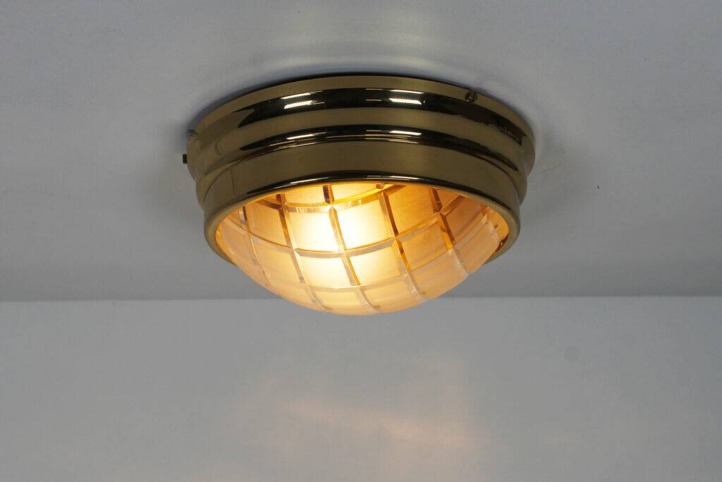 Pair of vintage brass ceiling lights with glass globe