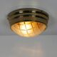 Pair of vintage brass ceiling lights with glass globe