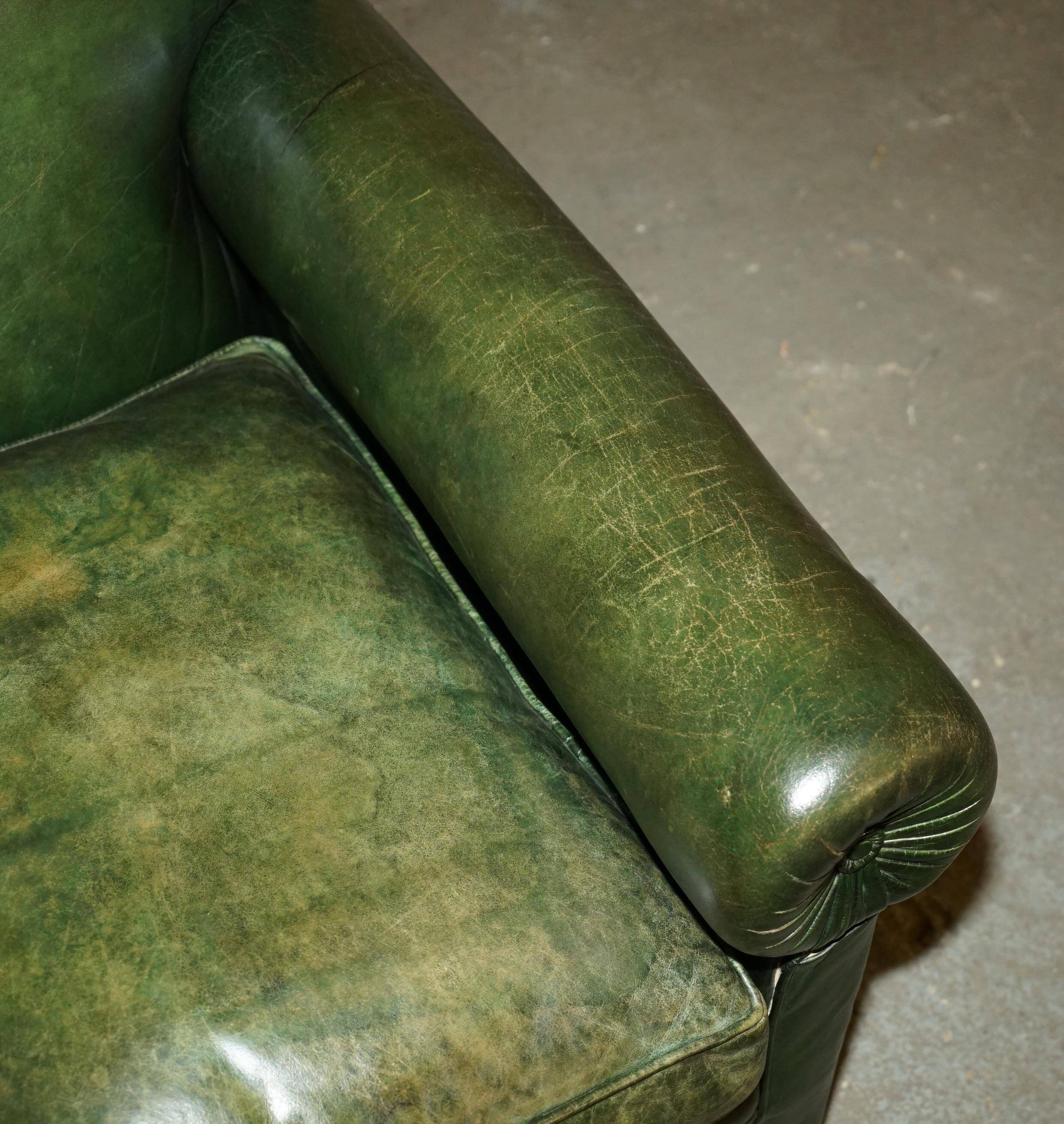 Victorian leather canapé, shield armrests, stamped Maple & Co.