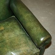Victorian leather canapé, shield armrests, stamped Maple & Co.
