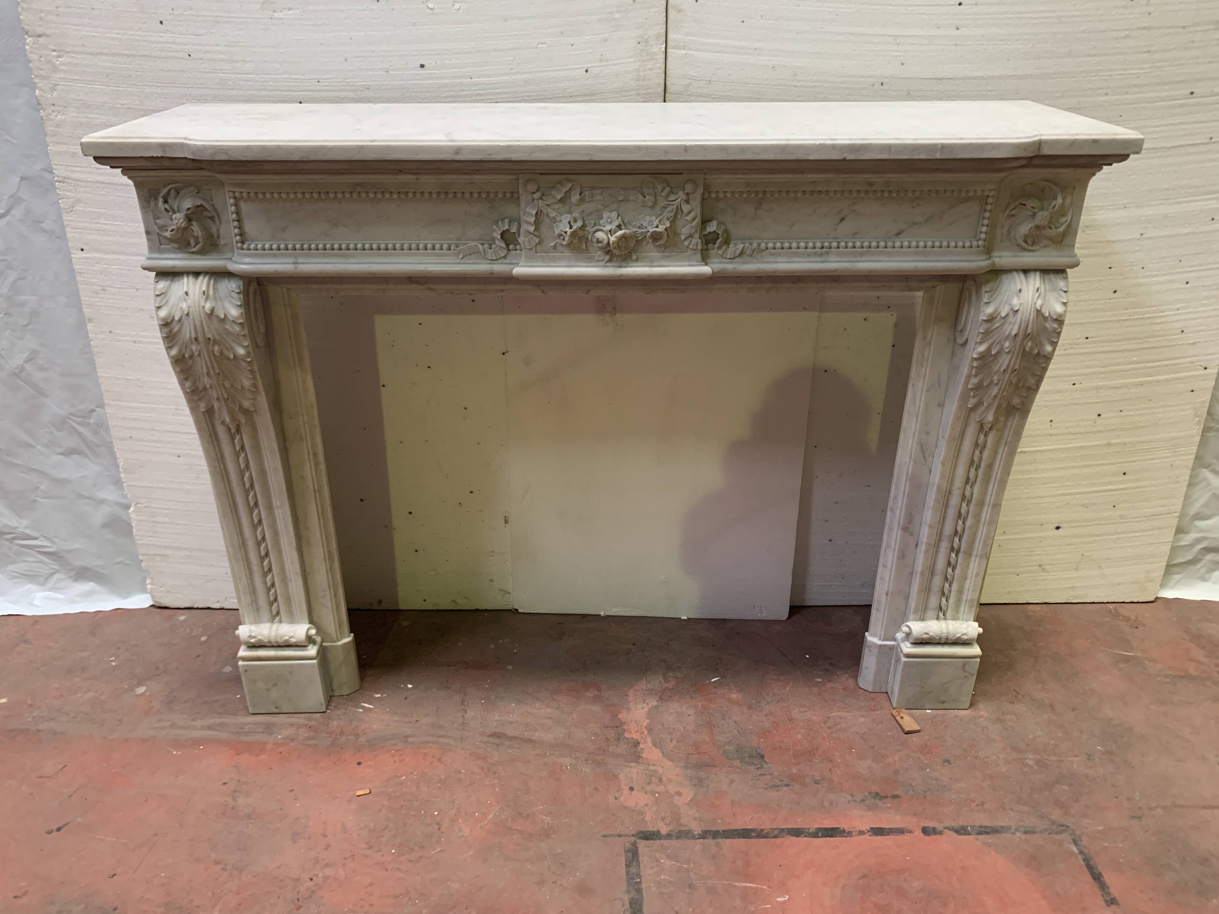 Louis XVI style fireplace in white Carrara marble, 19th century