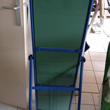Adjustable mirror on vintage blue tubular structure stand