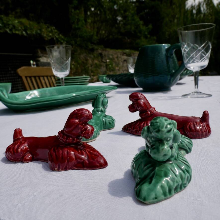4 knife holders in the shape of poodles
