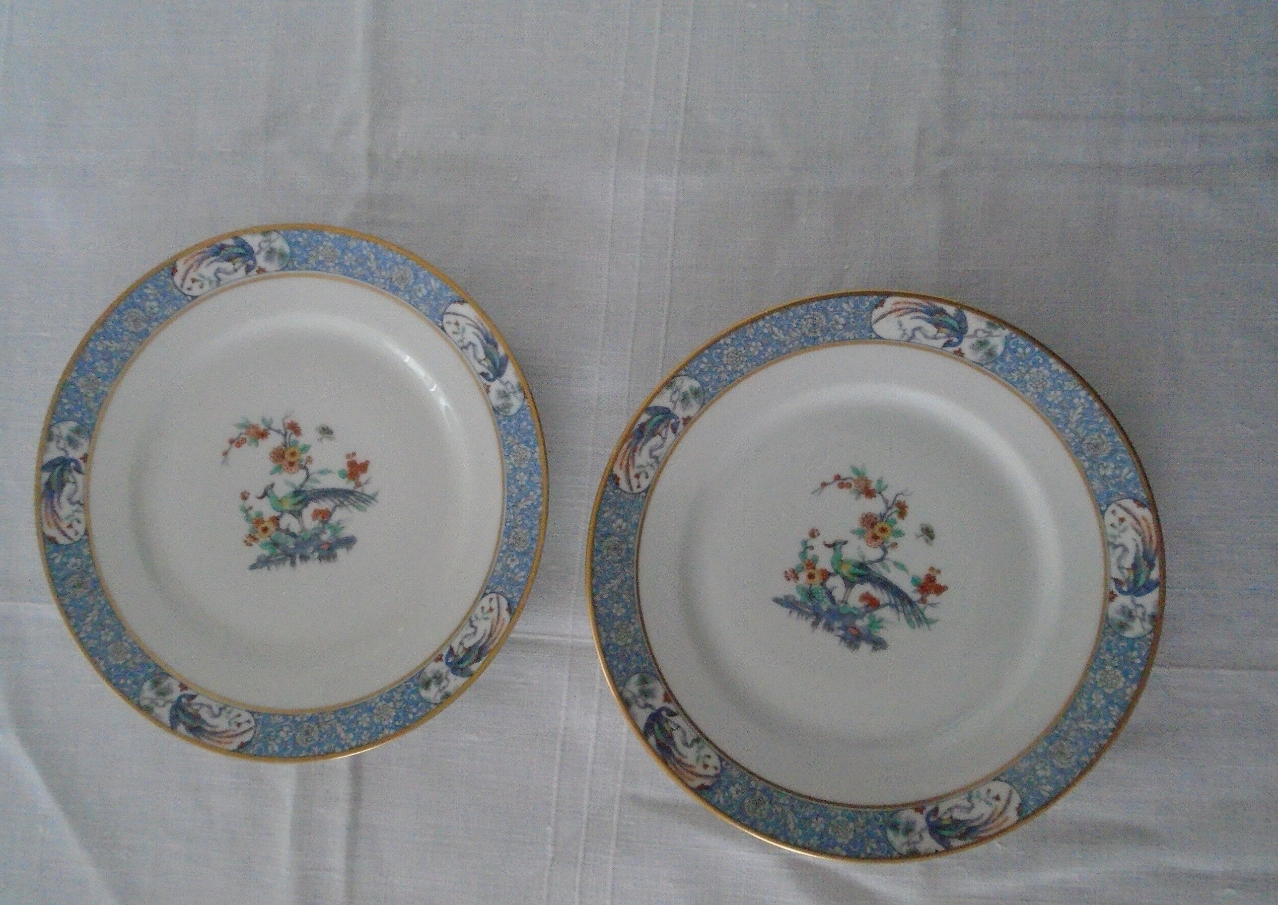 2 flat plates Haviland Limoges blue decoration and gold medallion bird