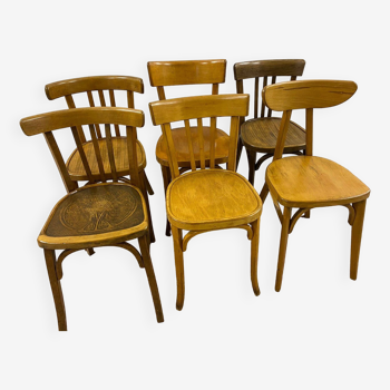 Set of 6 mismatched bistro chairs including Baumann and Luterma chairs