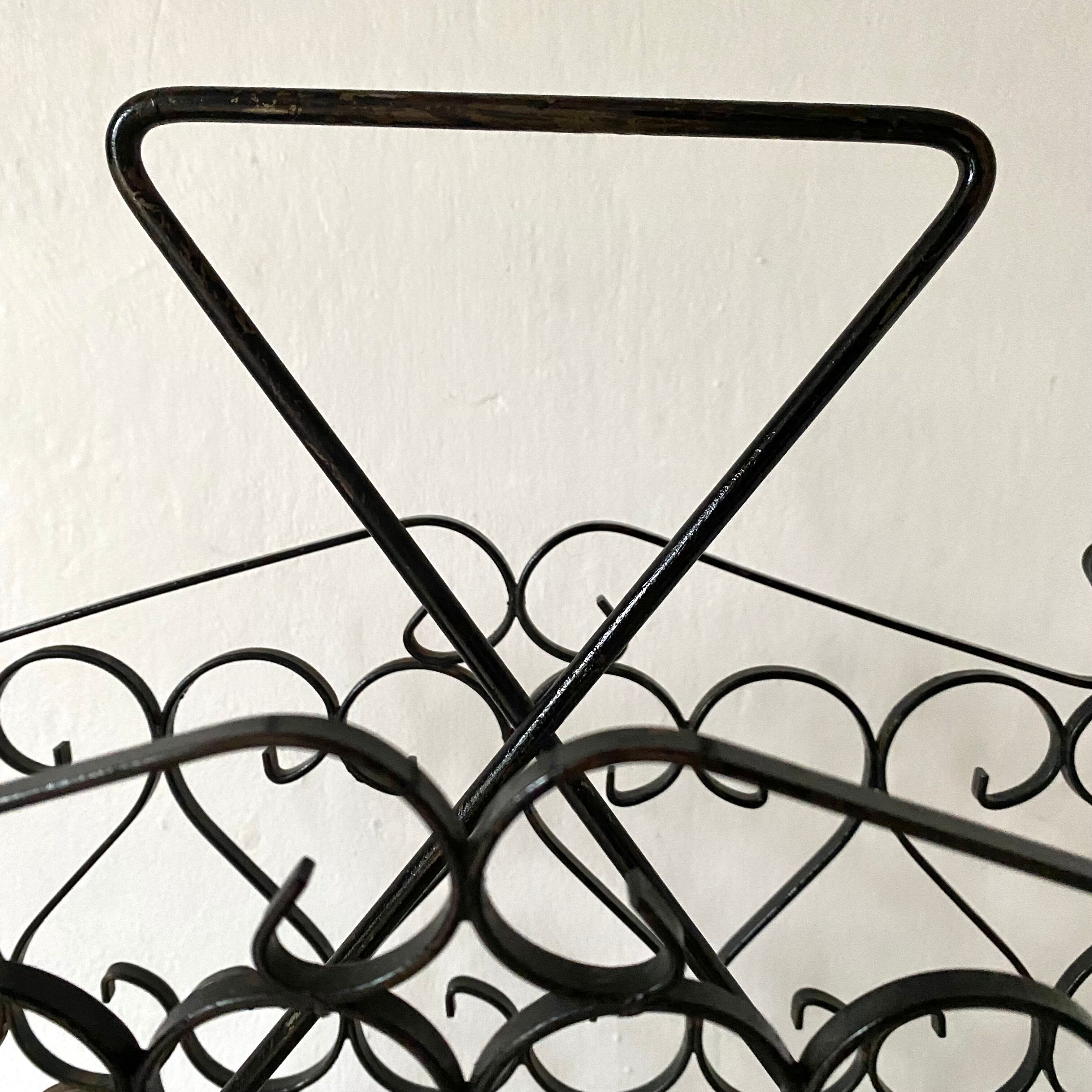 Porte revue en fer forgé années 50