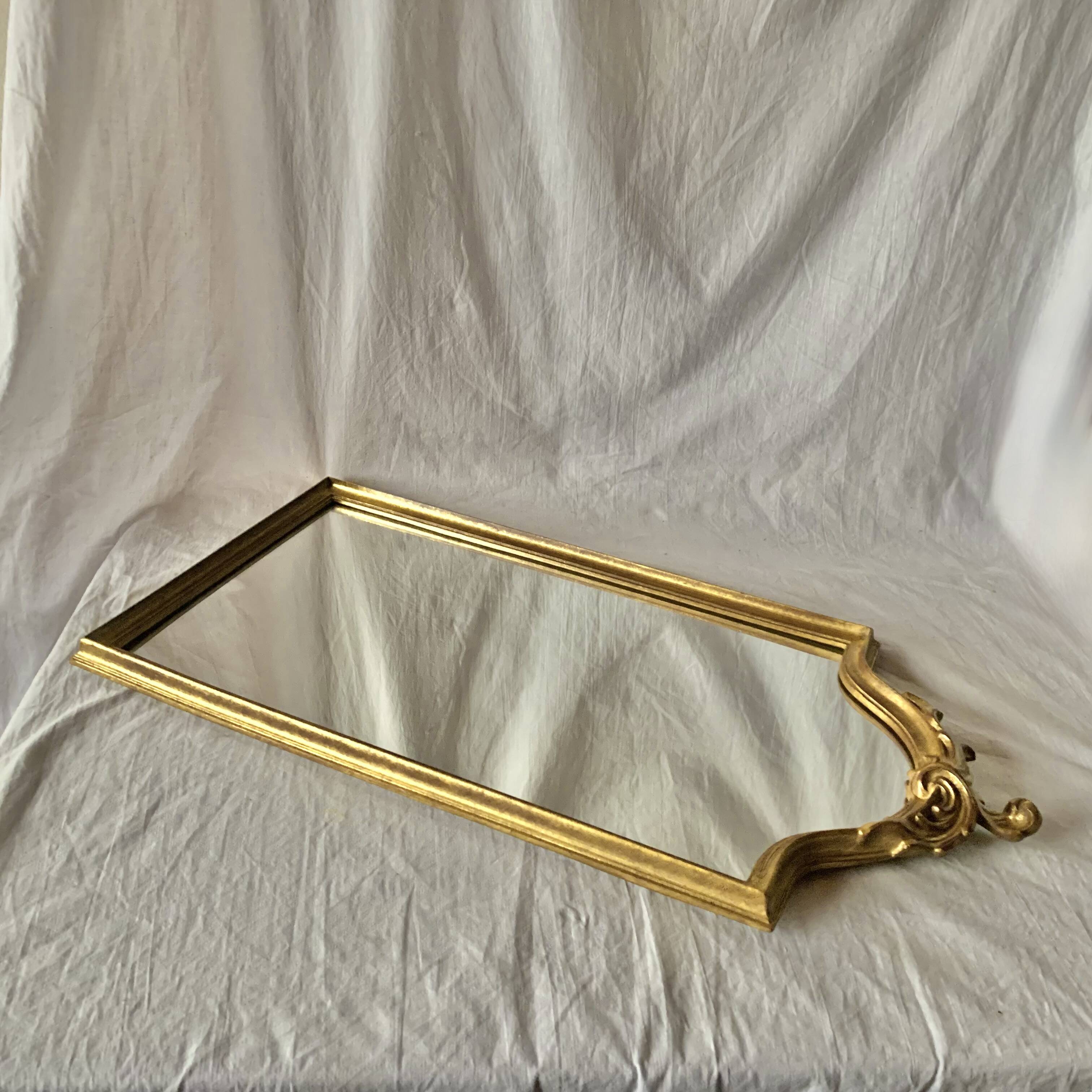 Antique Deknudt mirror in golden resin - 70 x 34 cm