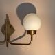Brass and opaline two-light wall lamp, 1960