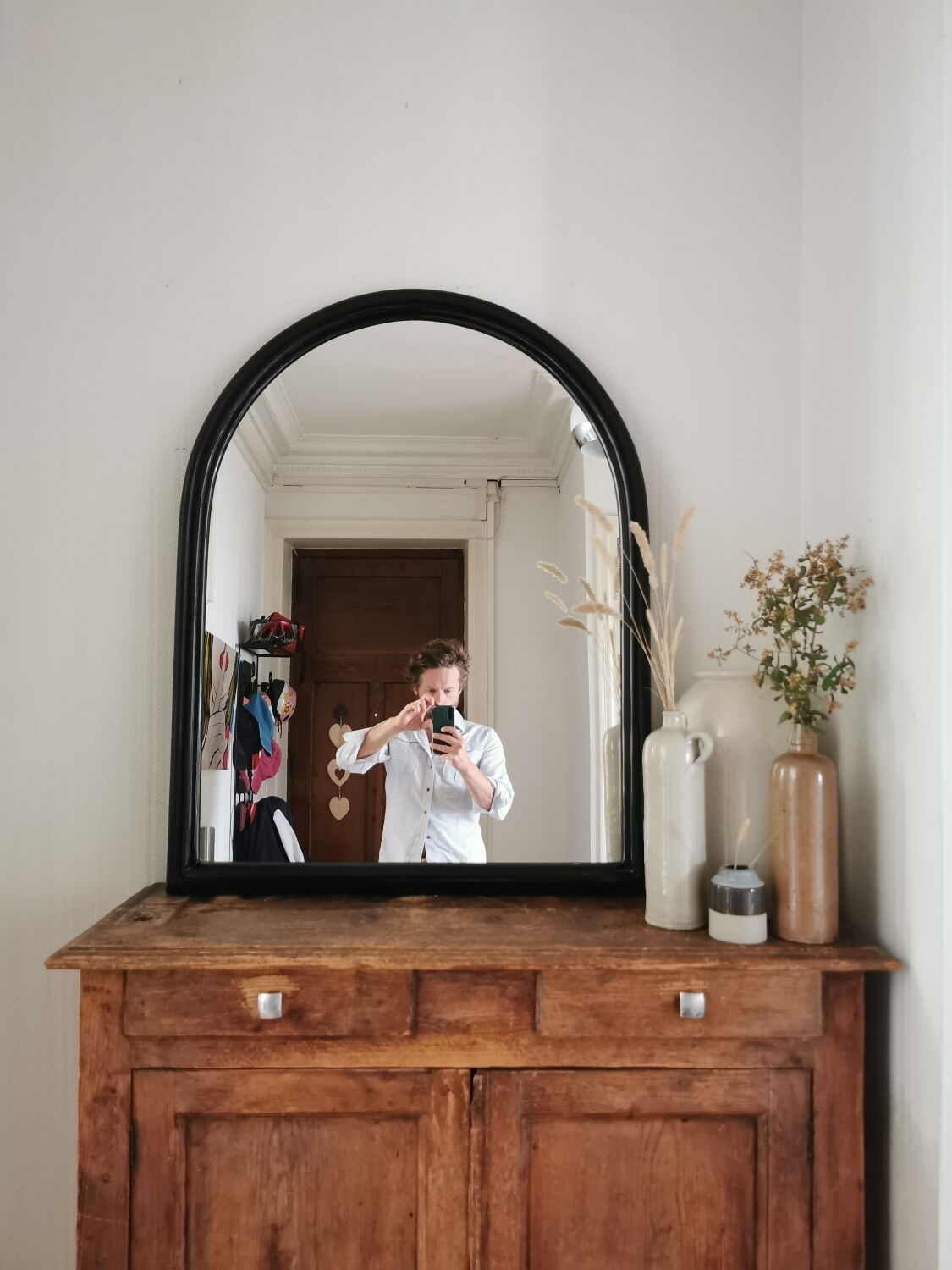 Large black lacquered mirror 1970