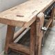 Old carpenter's workbench with eight metal drawers, industrial console
