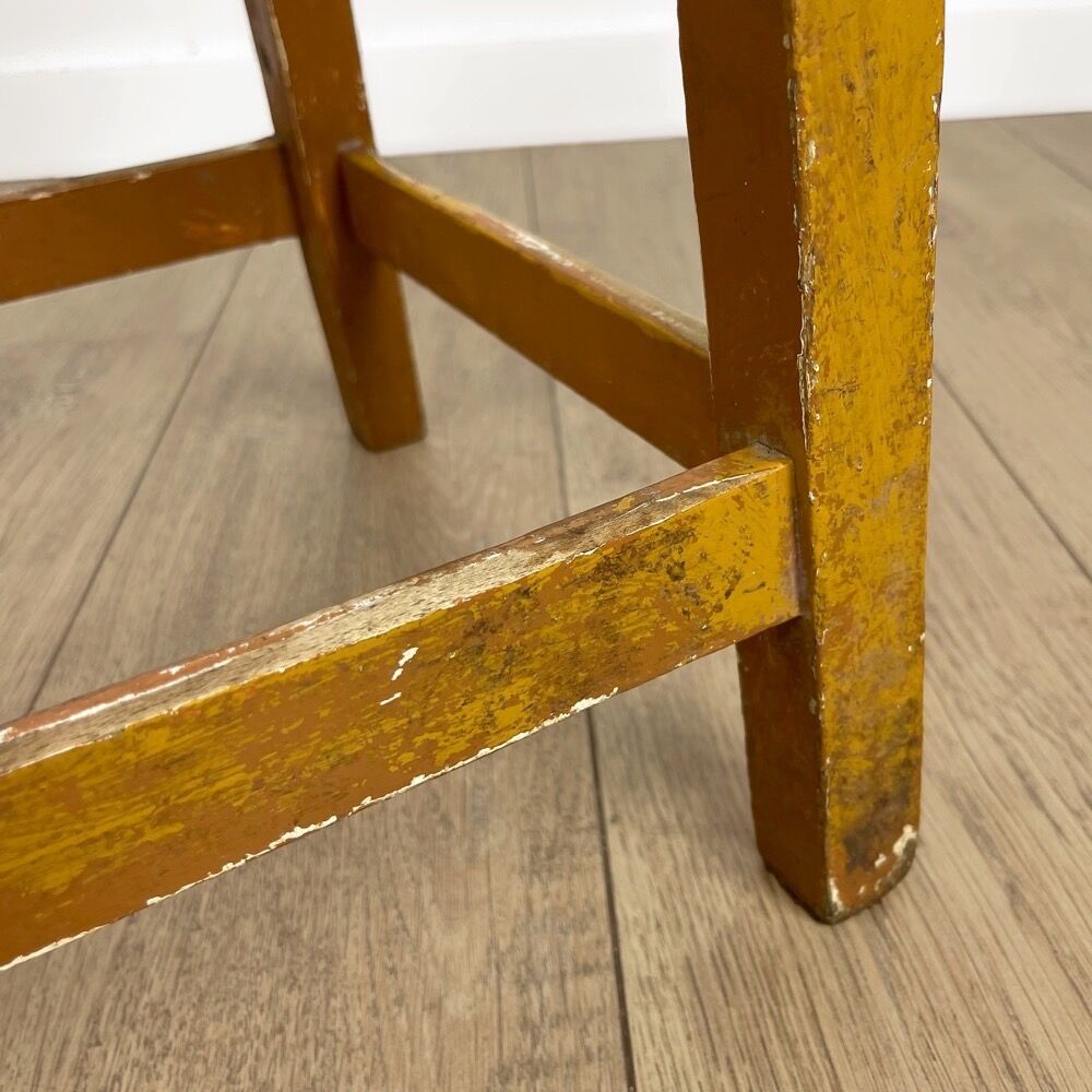 Old slotted milking stool