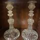 pair of cut glass candlesticks with lion and ram head decor, late 19th century