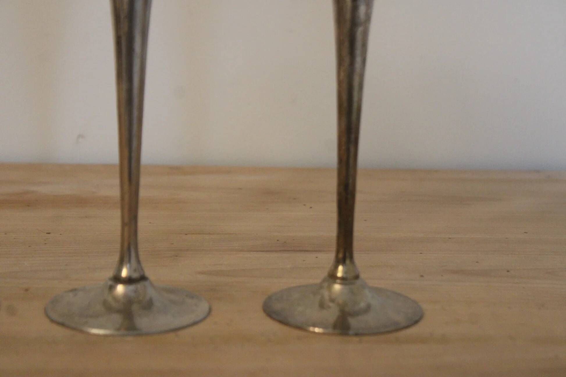 Set of 3 vintage silver-plated and gold footed cups.