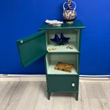 Two-door green bedside table