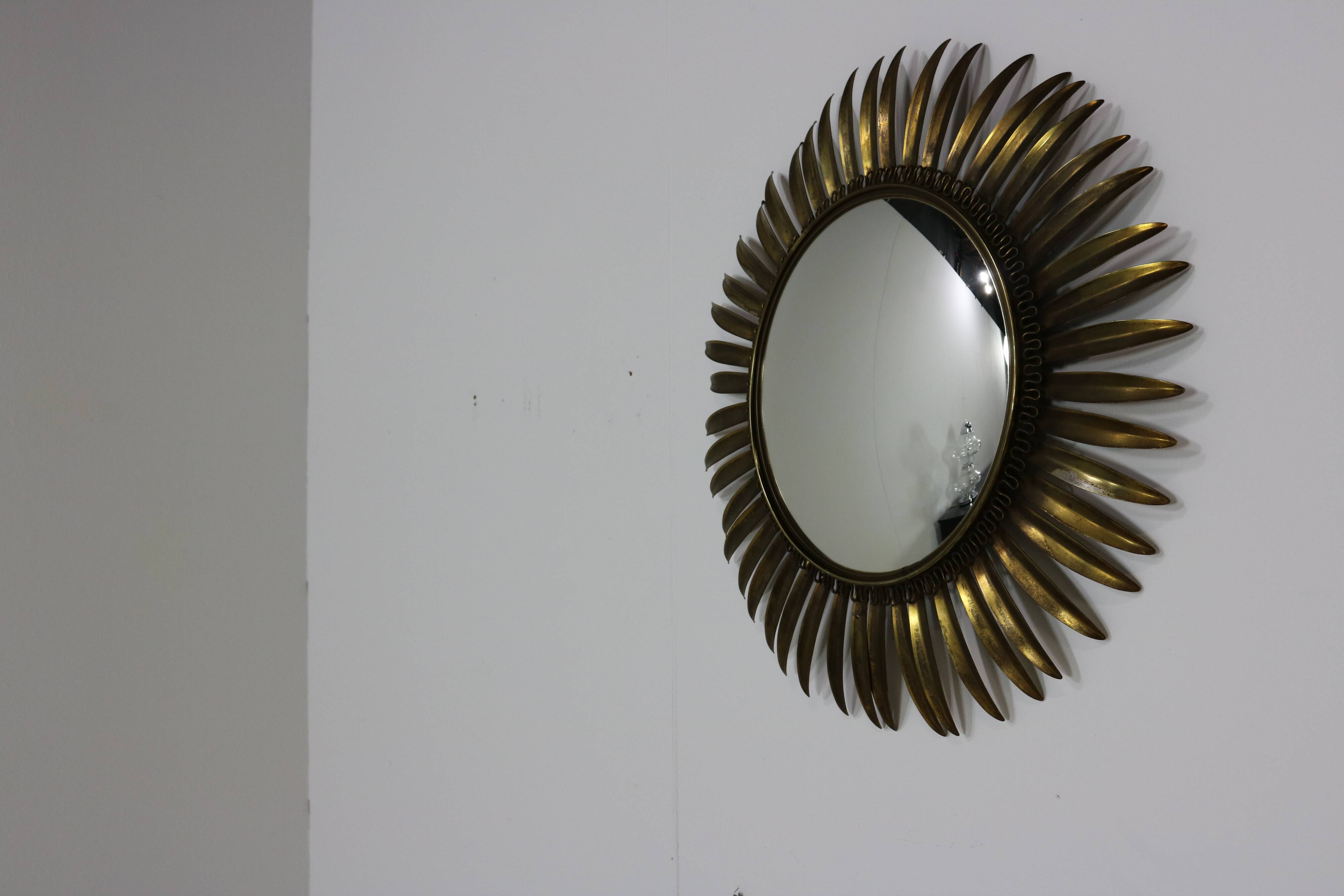 Typical midcentury sunburst wall mirror