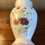 Round vase in earthenware decoration flowers