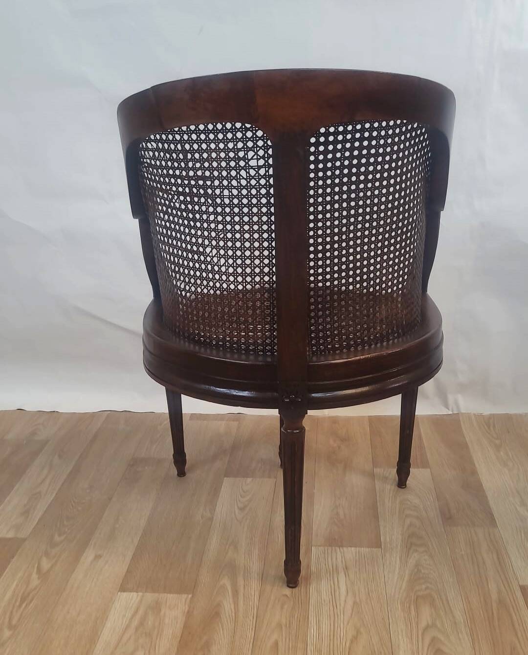 Carved wooden cane armchair – Louis XVI style