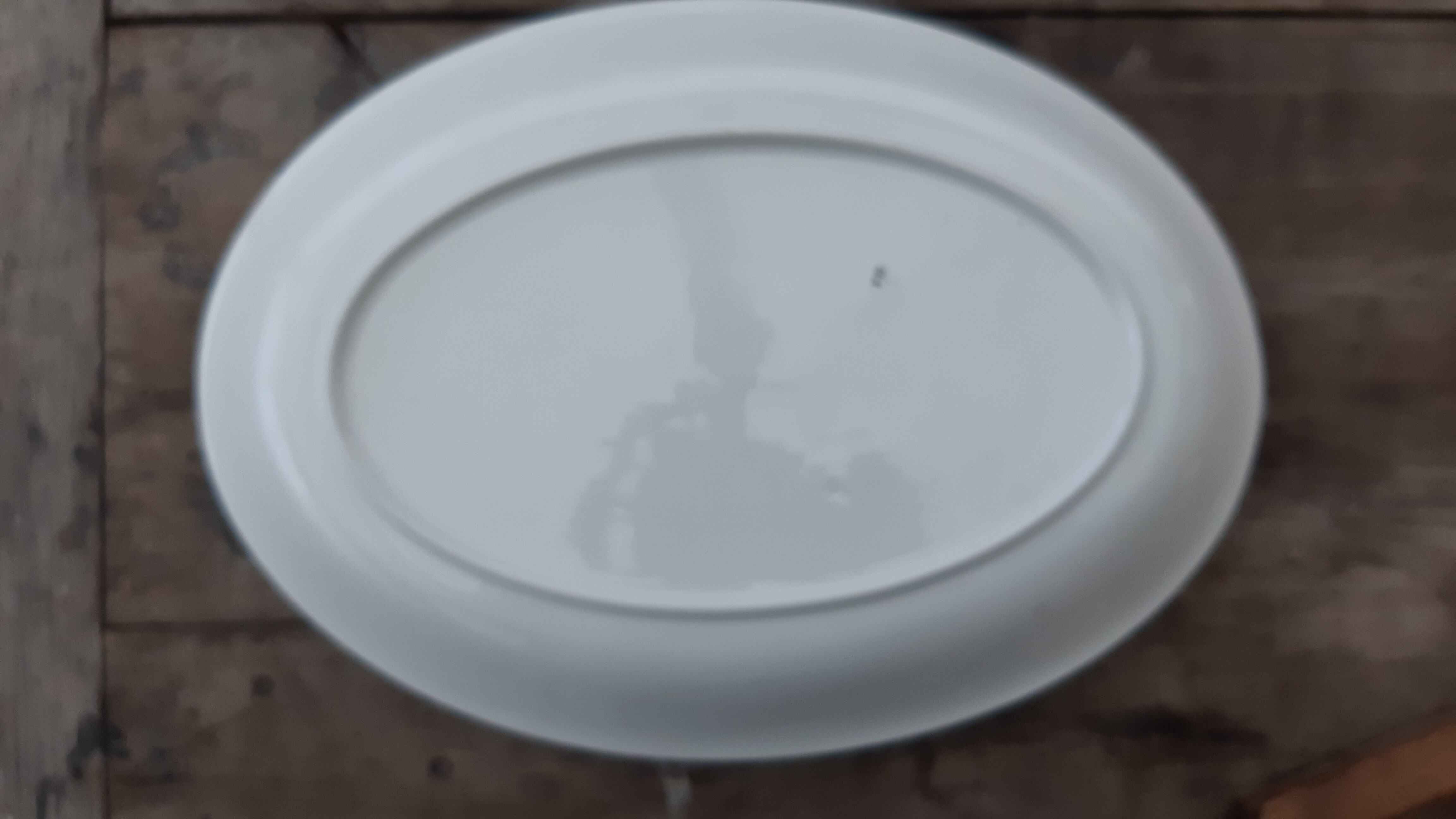 Flat oval faience of Badonviller