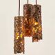 Suspension composed of 3 brutalist copper lamps by Aimo Tukiainen, 1960s.